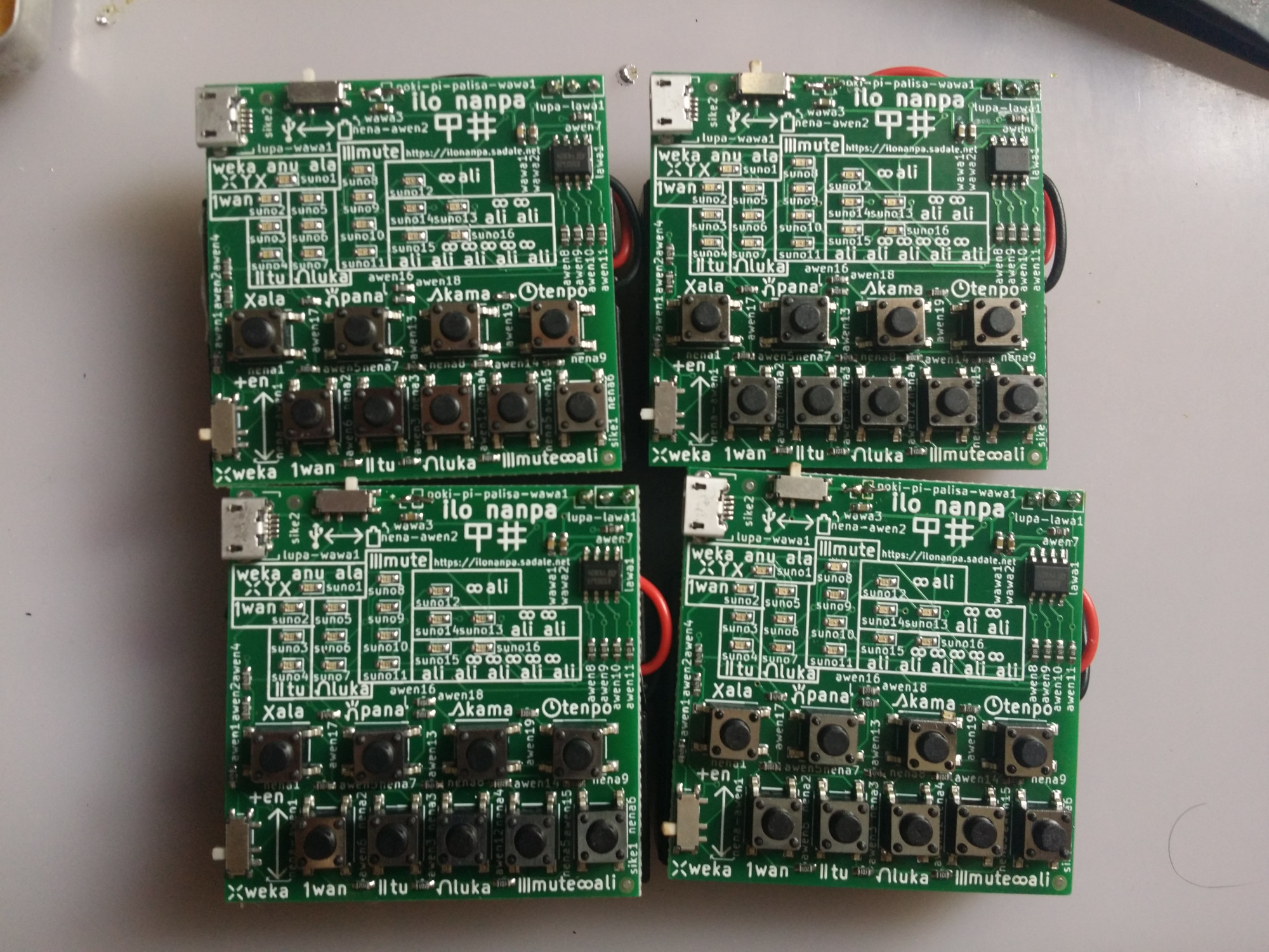 A photo showing four units of assembled ilo nanpa devices